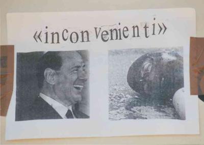 Plakat: Berlusconi lacht über toten Giuliani